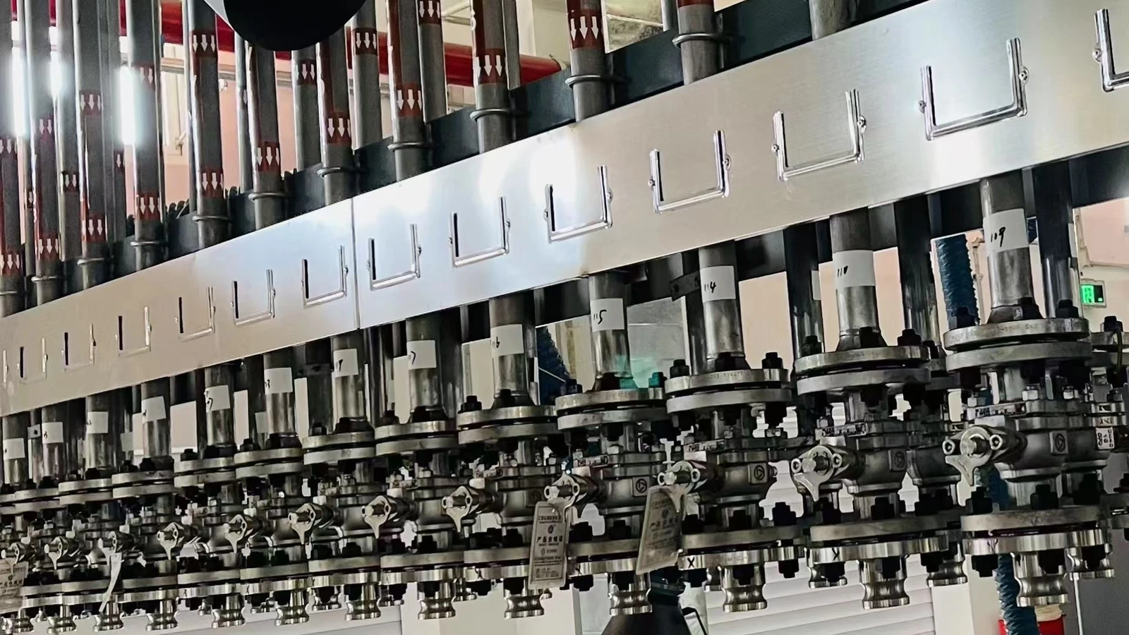 Filling line and dispensing stations